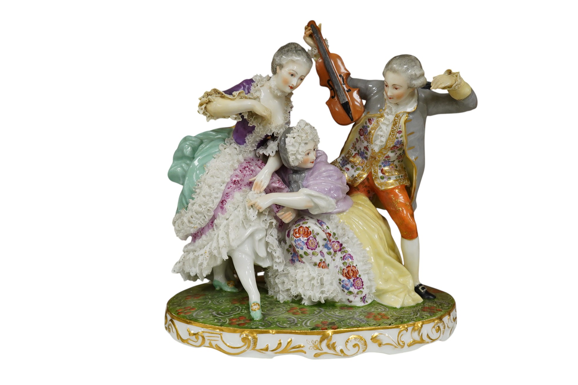 A large German porcelain group of ladies and a violinist, early 20th century, 23cm high